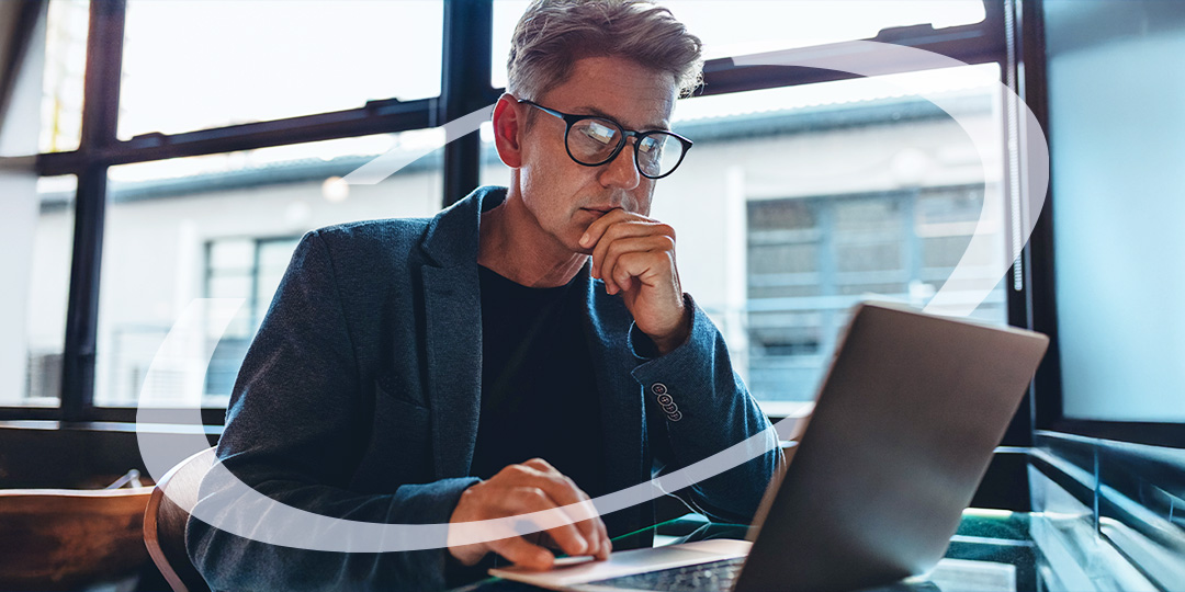 Man looking at a laptop