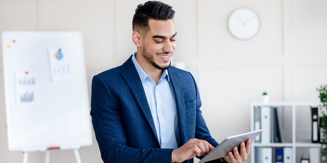 Business man looking at laptop