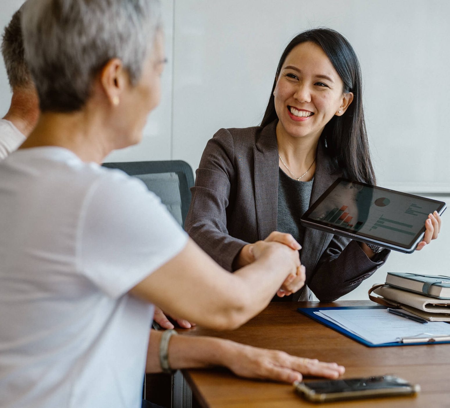 Two Business Owners meeting with Business Broker